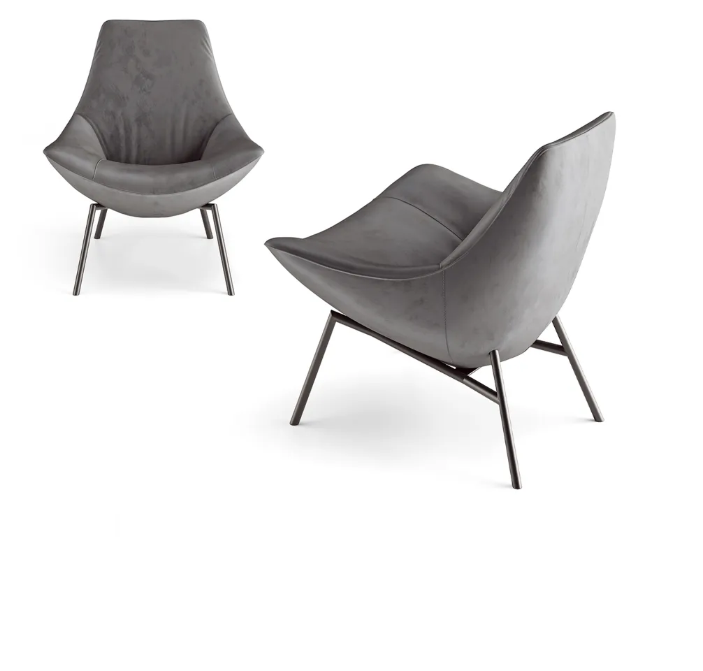 thelma armchair design enveloping