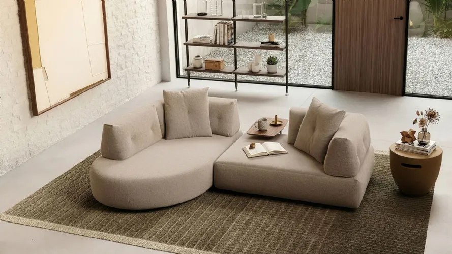 Lotus sofa with a rounded chaise longue