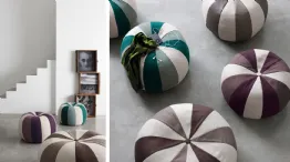 Bound colored round pouf