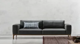 Leonard divano con basamento in legno